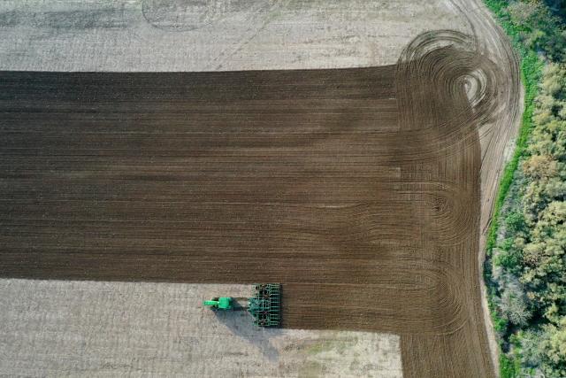 (251223) -- BET SHEMESH, Dec. 23, 2025 (Xinhua) -- An aerial drone photo taken on Dec. 22, 2025 shows a tractor working in a farm field in Bet Shemesh, Israel. Israel has experienced unusually early and heavy rains this winter, with precipitation in many areas already reaching the annual average. The rainfall has eased drought conditions in some parts of the country. (Photo by Gil Cohen Magen/Xinhua)