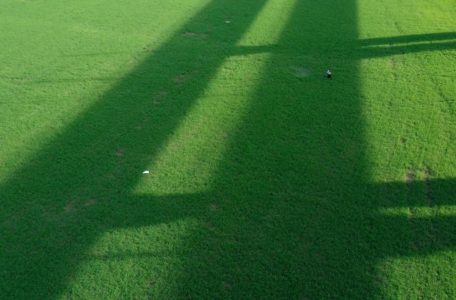 (251223) -- BET SHEMESH, Dec. 23, 2025 (Xinhua) -- An aerial drone photo taken on Dec. 22, 2025 shows people walking in a farm field in Bet Shemesh, Israel. Israel has experienced unusually early and heavy rains this winter, with precipitation in many areas already reaching the annual average. The rainfall has eased drought conditions in some parts of the country. (Photo by Gil Cohen Magen/Xinhua)