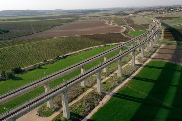 (251223) -- BET SHEMESH, Dec. 23, 2025 (Xinhua) -- A drone photo taken on Dec. 22, 2025 shows rail tracks running through farm fields near Bet Shemesh, Israel. Israel has experienced unusually early and heavy rains this winter, with precipitation in many areas already reaching the annual average. The rainfall has eased drought conditions in some parts of the country. (Photo by Gil Cohen Magen/Xinhua)