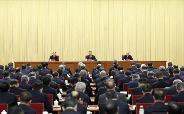 (251223) -- BEIJING, Dec. 23, 2025 (Xinhua) -- Chinese Premier Li Qiang, also a member of the Standing Committee of the Political Bureau of the Communist Party of China (CPC) Central Committee, attends a meeting of heads of central state-owned enterprises (SOEs) and delivers a speech in Beijing, capital of China. An important instruction by Chinese President Xi Jinping, also general secretary of the CPC Central Committee and chairman of the Central Military Commission, was conveyed at the meeting, which was held here on Monday and Tuesday. (Xinhua/Huang Jingwen)