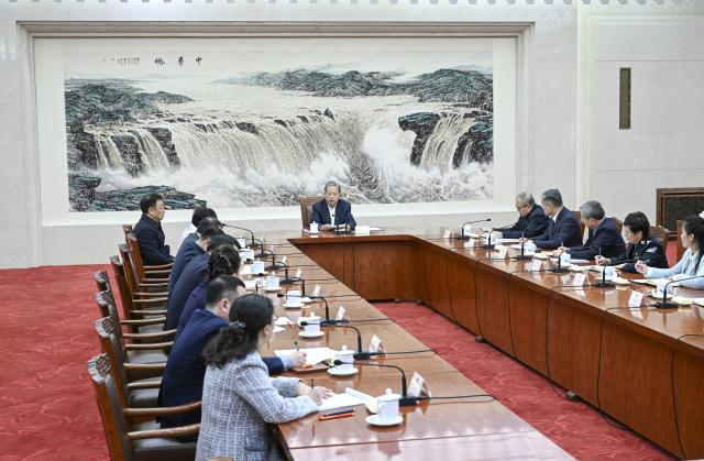 (251223) -- BEIJING, Dec. 23, 2025 (Xinhua) -- Zhao Leji, a member of the Standing Committee of the Political Bureau of the Communist Party of China (CPC) Central Committee and chairman of the National People's Congress (NPC) Standing Committee, speaks at a meeting with NPC deputies who are sitting in on the 19th session of the 14th NPC Standing Committee in Beijing, capital of China, Dec. 23, 2025. (Xinhua/Zhang Ling)