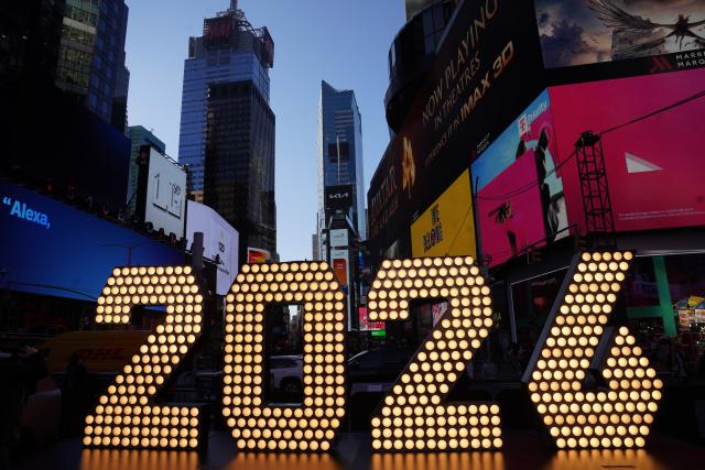 (251224) -- BEIJING, Dec. 24, 2025 (Xinhua) -- This photo taken on Dec. 22, 2025 shows a light installation for the upcoming 2026 at Times Square in New York, the United States. (Xinhua/Zhang Fengguo)