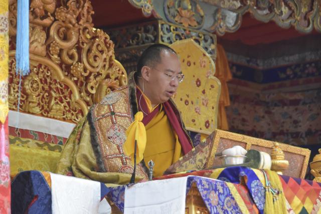 (251224) -- LHASA, Dec. 24, 2025 (Xinhua) -- Panchen Erdeni Chos-kyi rGyal-po, a member of the Standing Committee of the National Committee of the Chinese People's Political Consultative Conference, vice president of the Buddhist Association of China and president of the Xizang branch of the Buddhist Association of China, attends the Kalachakra (wheel of time) ritual at Tashilhunpo Monastery, in Xigaze City, southwest China's Xizang Autonomous Region, Oct. 11, 2025. TO GO WITH "China Focus: Panchen Rinpoche concludes Xizang tour" (Xinhua/Dronla)