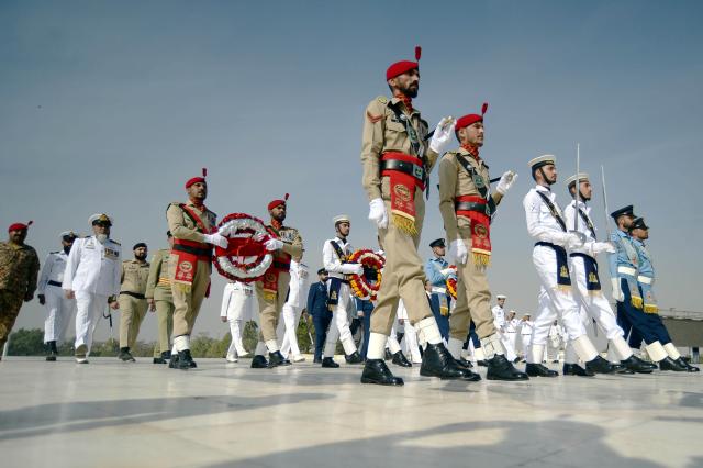(251225) -- PAKISTAN, Dec. 25, 2025 (Xinhua) -- Security officials attend a ceremony marking the 149th birth anniversary of the founder of Pakistan Muhammad Ali Jinnah in Karachi, Pakistan on Dec. 25, 2025. Born on Dec. 25, 1876, Jinnah led a movement to get a separate homeland for the Muslims of the British-ruled Indian subcontinent in 1947. (Str/Xinhua)
