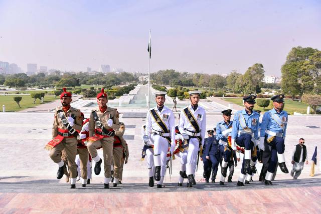 (251225) -- PAKISTAN, Dec. 25, 2025 (Xinhua) -- Security officials attend a ceremony marking the 149th birth anniversary of the founder of Pakistan Muhammad Ali Jinnah in Karachi, Pakistan on Dec. 25, 2025. Born on Dec. 25, 1876, Jinnah led a movement to get a separate homeland for the Muslims of the British-ruled Indian subcontinent in 1947. (Str/Xinhua)