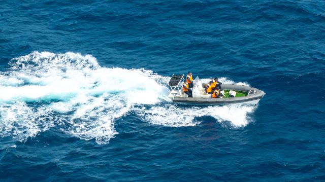 (251225) -- SOUTH CHINA SEA, Dec. 25, 2025 (Xinhua) -- This aerial drone photo taken on Nov. 14, 2025 shows law enforcers of the China Coast Guard (CCG) vessel Huangyan conducting a patrol in the territorial waters of China's Huangyan Dao.
  The CCG vessel Huangyan conducted routine patrols in the territorial waters of China's Huangyan Dao from November to December. 
  The operations of CCG vessels aimed to strengthen the management and control of the related maritime areas and firmly safeguard China's territorial sovereignty and maritime rights and interests. (Xinhua/Bei He)