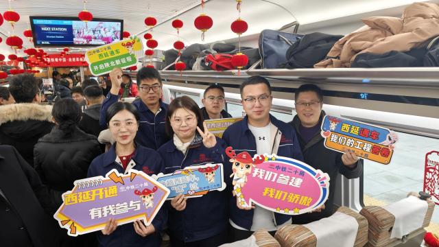 (251226) -- XI'AN, Dec. 26, 2025 (Xinhua) -- Constructors pose for a group photo on the first train of the Xi'an-Yan'an high-speed railway at Yan'an Station in Yan'an, northwest China's Shaanxi Province, Dec. 26, 2025. A sleek silver bullet train departed Yan'an in northwest China's Shaanxi Province on Friday, linking the sacred revolutionary heartland to the country's rapidly expanding high-speed rail network.
   The newly opened 299-km line connects Yan'an with Xi'an, the provincial capital and home to the famed Terracotta Warriors, slashing travel time between the two cities from about 2.5 hours to roughly one hour.
   Designed for operations of up to 350 km per hour, the line marked the fastest train running on the Loess Plateau. (Xinhua/Xing Guangli)