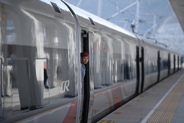 (251226) -- XI'AN, Dec. 26, 2025 (Xinhua) -- C9312, the first train of the Xi'an-Yan'an high-speed railway, is pictured at Fuping South Railway Station in northwest China's Shaanxi Province, on Dec. 26, 2025. A sleek silver bullet train departed Yan'an in northwest China's Shaanxi Province on Friday, linking the sacred revolutionary heartland to the country's rapidly expanding high-speed rail network.
   The newly opened 299-km line connects Yan'an with Xi'an, the provincial capital and home to the famed Terracotta Warriors, slashing travel time between the two cities from about 2.5 hours to roughly one hour.
   Designed for operations of up to 350 km per hour, the line marked the fastest train running on the Loess Plateau. (Xinhua/Li Yibo)