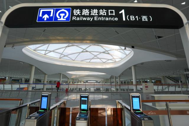 (251226) -- BEIJING, Dec. 26, 2025 (Xinhua) -- This photo taken on Dec. 25, 2025 shows an entrance of the Beijing Tongzhou Railway Station in Beijing, capital of China. The railway station, located in the comprehensive transportation hub of Beijing's sub-center Tongzhou District, will be officially put into operation on Dec. 30. (Xinhua/Ju Huanzong)