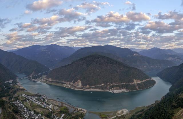 (251226) -- NANJIAN, Dec. 26, 2025 (Xinhua) -- An aerial drone photo taken on Dec. 25, 2025 shows a water sports base on the Lancang River in Gonglang Town in Nanjian Yi Autonomous County, southwest China's Yunnan Province. In recent years, Gonglang Town, boasting an advantageous ecological environment and pleasant climate throughout the year, has actively revitalized the rural economy by developing water sports initiatives and promoting cultural tourism.
   The town has established competitive, training, and experiential settings for a diverse range of open-water sports, and has proactively sought to host sports events and training programs. Additionally, it provides a host of cultural and tourism services, including catering and travel photography. These concerted efforts have created employment opportunities and diversified income sources for local villagers. (Photo by Gong Zujin/Xinhua)