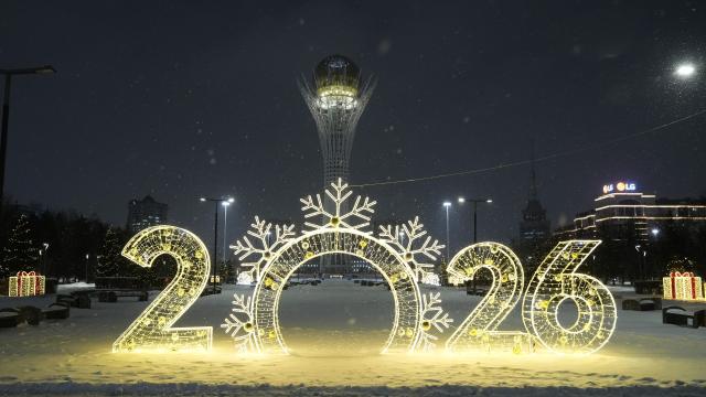 (251226) -- ASTANA, Dec. 26, 2025 (Xinhua) -- New Year decorations are seen in front of the Baiterek Tower in Astana, Kazakhstan, Dec. 25, 2025. Astana has been adorned in festive decorations recently as the New Year approaches. (Photo by Kalizhan Ospanov/Xinhua)