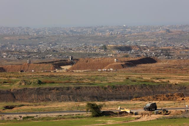 (251226) -- SDEROT, Dec. 26, 2025 (Xinhua) -- An Israeli military vehicle is seen on the southern Israeli border with the Gaza Strip, on Dec. 25, 2025. (Photo by Gil Cohen Magen/Xinhua)