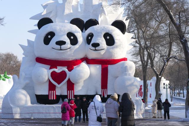 (251227) -- HARBIN, Dec. 27, 2025 (Xinhua) -- This photo taken on Dec. 26, 2025 shows a snow sculpture displayed at the venue of the 38th Sun Island International Snow Sculpture Art Expo in Harbin, northeast China's Heilongjiang Province. The 38th Sun Island International Snow Sculpture Art Expo opened here for trial on Saturday, with an exhibition area of 1.5 million square meters and a snow-using volume of 120,000 cubic meters. (Xinhua/Wang Song)