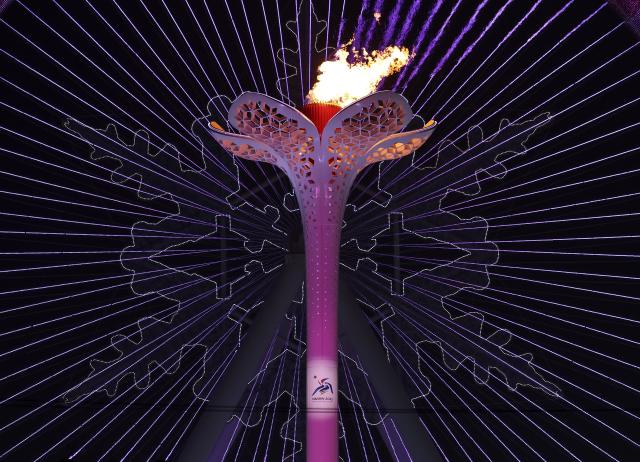 (251227) -- BEIJING, Dec. 27, 2025 (Xinhua) -- Here is Xinhua News Agency's selection of the 10 most significant pieces of Chinese sports news in 2025: On February 7, Chinese President Xi Jinping declared the 9th Asian Winter Games (AWG) open in Harbin, northeast China's Heilongjiang Province. Another major international winter sports event held in China after the 2022 Winter Olympics, the eight-day AWG attracted more than 1,200 athletes from 34 countries and regions, showcasing China's continuous progress in winter sports.
This file photo taken on Feb. 7, 2025 shows the cauldron is lit during the opening ceremony of the 9th Asian Winter Games in Harbin, northeast China's Heilongjiang Province. (Xinhua/Zheng Huansong)