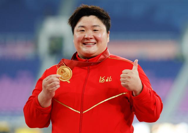 (251227) -- BEIJING, Dec. 27, 2025 (Xinhua) -- As the sporting calendar draws to a close, Xinhua News Agency has selected the top 10 Chinese athletes for 2025.
   2. Gong Lijiao (female, athletics)
   36-year-old Gong overcame lingering injuries to win the women's shot put title in her National Games farewell, achieving an unprecedented fifth consecutive National Games crown in athletics. Over a 25-year career, Gong has completed a career Grand Slam, winning titles at the Olympic Games, World Championships and National Games.
   This file photo taken on Nov. 16, 2025 shows gold medalist Gong Lijiao of Hebei posing during the awarding ceremony for the women's shot put of athletics at China's 15th National Games in Guangzhou, south China's Guangdong Province. (Xinhua/Huang Wei)