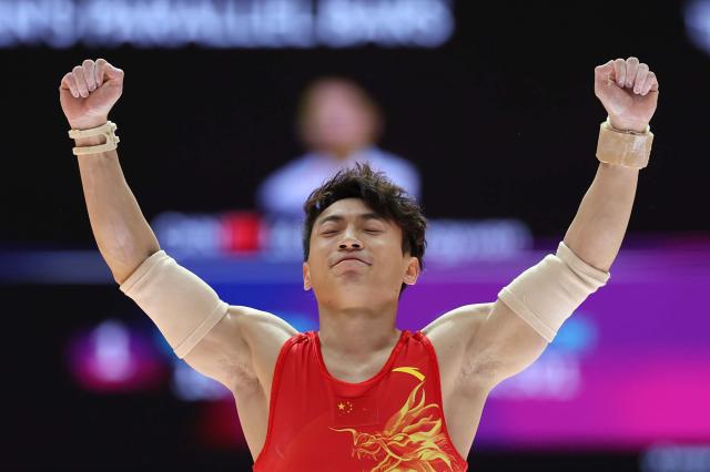 (251227) -- BEIJING, Dec. 27, 2025 (Xinhua) -- As the sporting calendar draws to a close, Xinhua News Agency has selected the top 10 Chinese athletes for 2025.
7. Zou Jingyuan (male, gymnastics)
Zou continued his dominance on the parallel bars, becoming the first four-time winner in the event at the World Championships before completing a third consecutive National Games title. At the 15th National Games, he also clinched gold medal in the all-around event, which consisted of pommel horse, rings and parallel bars.
This file photo taken on Oct. 25, 2025 shows Zou Jingyuan of China celebrating during the the Men's Parallel Bars Final at 53rd FIG Artistic Gymnastics World Championships in Jakarta, Indonesia. (Xinhua/Bai Xuefei)