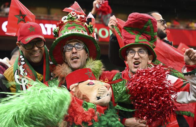 (251227) -- RABAT, Dec. 27, 2025 (Xinhua) -- Fans of Morocco pose for photos during a 2025 Africa Cup of Nations group stage match between Morocco and Mali in Rabat, Morocco, Dec. 26, 2025. (Photo by Aissa/Xinhua)