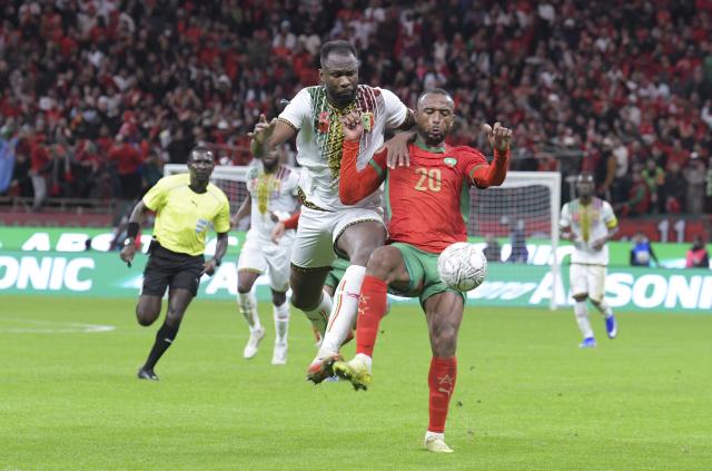 (251227) -- RABAT, Dec. 27, 2025 (Xinhua) -- Ayoub El Kaabi (R) of Morocco vies with Abdoulaye Diaby of Mali during a 2025 Africa Cup of Nations group stage match between Morocco and Mali in Rabat, Morocco, Dec. 26, 2025. (Photo by Aissa/Xinhua)