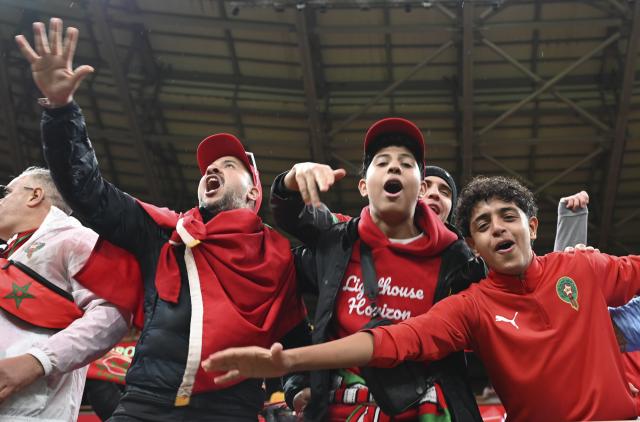 (251227) -- RABAT, Dec. 27, 2025 (Xinhua) -- Fans of Morocco pose for photos during a 2025 Africa Cup of Nations group stage match between Morocco and Mali in Rabat, Morocco, Dec. 26, 2025. (Photo by Aissa/Xinhua)