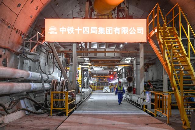 (251227) -- NANJING, Dec. 27, 2025 (Xinhua) -- This photo taken on Dec. 27, 2025 shows the rear of the "Xinzhengcheng" tunnel boring machine at the construction site of Nanjing Metro Line 4 Phase II, in Nanjing, east China's Jiangsu Province. A 3,062.6-meter-long double-track tunnel of Nanjing Metro Line 4 Phase II completed tunneling on Saturday. It is the deepest cross-river metro tunnel in the Yangtze River Delta region. 
  The Nanjing Metro Line 4 Phase II, with a total length of about 10 km, has six stations. (Xinhua/Ji Chunpeng)