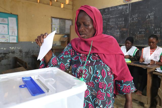 (251227) -- ABIDJAN, Dec. 27, 2025 (Xinhua) -- A voter casts her ballot at a polling station in Abidjan, Cote d'Ivoire, Dec. 27, 2025. Polling stations opened on Saturday morning across Cote d'Ivoire for legislative elections to renew the 255 seats of the National Assembly, Xinhua reporters observed on site in Abidjan, the country's economic capital.
TO GO WITH "Polling opens for legislative elections in Cote d'Ivoire " (Photo by Yvan Sonh/Xinhua)