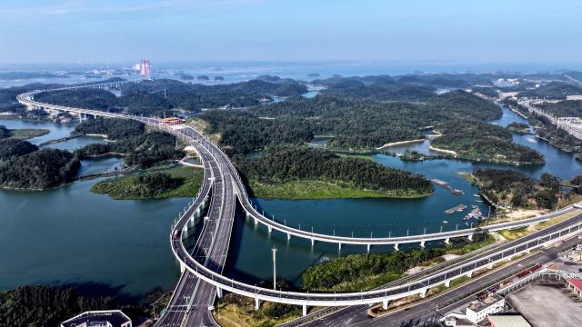 (251227) -- QINZHOU, Dec. 27, 2025 (Xinhua) -- An aerial drone photo taken on Dec. 27, 2025 shows the winter scenery of the Maowei Sea in Qinzhou, south China's Guangxi Zhuang Autonomous Region. In winter, the Maowei Sea in Guangxi presents picturesque scenery. In recent years, Guangxi has implemented high-standard ecological protection of the marine environment in the Beibu Gulf, transforming the Maowei Sea into a new cultural and tourism landmark. (Xinhua/Zhang Ailin)