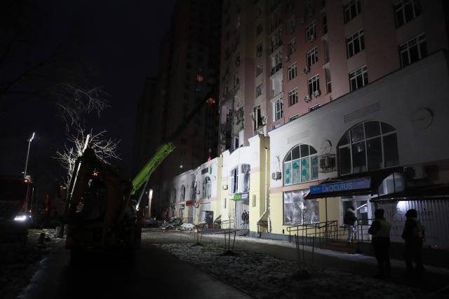 (251228) -- KIEV, Dec. 28, 2025 (Xinhua) -- Rescuers work at a damaged building in Kiev, capital of Ukraine, Dec. 27, 2025.
  At least two persons were killed and 46 others were injured in Russian strikes on the Ukrainian capital and its outskirts in the early hours of Saturday, local authorities said. (Xinhua/Li Dongxu)