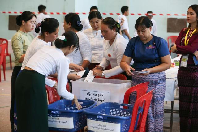 (251228) -- YANGON, Dec. 28, 2025 (Xinhua) -- Officials of the Union Election Commission count votes during the general election at a polling station in Yangon, Myanmar, Dec. 28, 2025. Myanmar kicked off its 2025 multi-party democratic general election with the first phase held on Sunday.
  The general election is scheduled to be held in three phases, with the second phase set for Jan. 11, 2026, followed by the third phase on Jan. 25. (Xinhua/Myo Kyaw Soe)