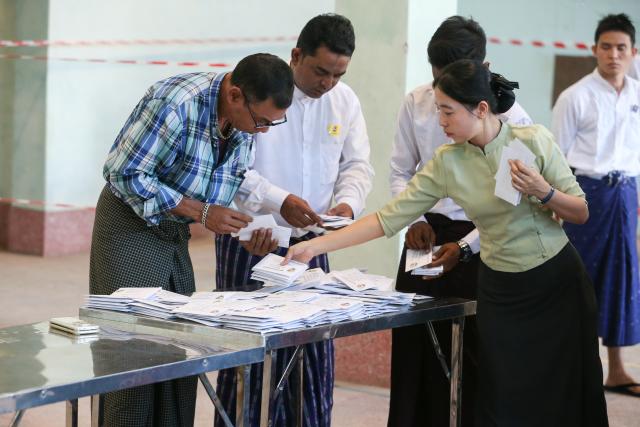 (251228) -- YANGON, Dec. 28, 2025 (Xinhua) -- Officials of the Union Election Commission count votes during the general election at a polling station in Yangon, Myanmar, Dec. 28, 2025. Myanmar kicked off its 2025 multi-party democratic general election with the first phase held on Sunday.
  The general election is scheduled to be held in three phases, with the second phase set for Jan. 11, 2026, followed by the third phase on Jan. 25. (Xinhua/Myo Kyaw Soe)