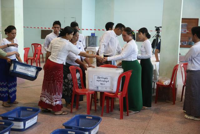 (251228) -- YANGON, Dec. 28, 2025 (Xinhua) -- Officials of the Union Election Commission count votes during the general election at a polling station in Yangon, Myanmar, Dec. 28, 2025. Myanmar kicked off its 2025 multi-party democratic general election with the first phase held on Sunday.
  The general election is scheduled to be held in three phases, with the second phase set for Jan. 11, 2026, followed by the third phase on Jan. 25. (Xinhua/Myo Kyaw Soe)