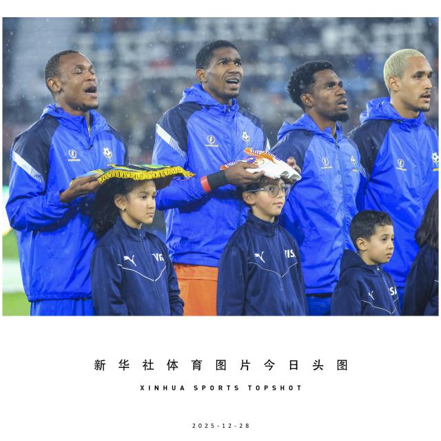 (251228) -- BEIJING, Dec. 28, 2025 (Xinhua) -- Players of Tanzania sing their national anthem before the group C match between Tanzania and Uganda at the Africa Cup of Nations 2025 in Rabat, Morocco, Dec. 27, 2025. (Photo by Hajarah Nalwadda/Xinhua)