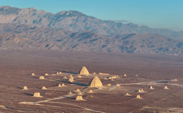 (251228) -- YINCHUAN, Dec. 28, 2025 (Xinhua) -- A drone photo taken on Dec. 28, 2025 shows Xixia imperial tombs in Yinchuan, northwest China's Ningxia Hui Autonomous Region. China's Xixia Imperial Tombs were officially added to the UNESCO World Heritage List on July 11, 2025 during the 47th session of the World Heritage Committee held in Paris, France. (Photo by Yuan Hongyan/Xinhua)
