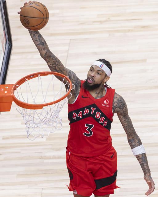 (251229) -- TORONTO, Dec. 29, 2025 (Xinhua) -- Brandon Ingram of Toronto Raptors dunks during the 2025-2026 NBA regular season game between Toronto Raptors and Golden State Warriors in Toronto, Canada, Dec. 28, 2025. (Photo by Zou Zheng/Xinhua)