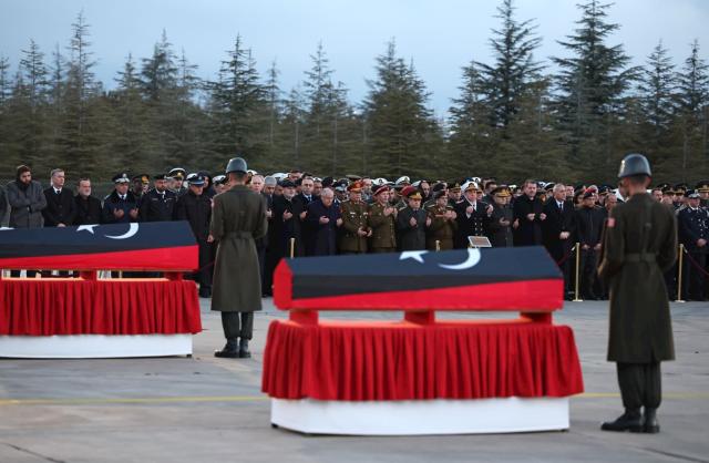 (251229) -- BEIJING, Dec. 29, 2025 (Xinhua) -- A military farewell ceremony is held for the remains of Libya's late army chief of staff Mohammed al-Haddad and his companions, who were killed in a plane crash in Türkiye earlier this week, in Ankara, Türkiye, Dec. 27, 2025. (Mustafa Kaya/Handout via Xinhua)