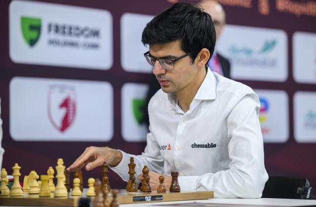 (251229) -- DOHA, Dec. 29, 2025 (Xinhua) -- Anish Giri of the Netherlands competes during the Rapid Open final round against Magnus Carlsen of Norway at the FIDE World Rapid & Blitz Championships 2025 in Doha, Qatar, Dec. 28, 2025. (Photo by Nikku/Xinhua)