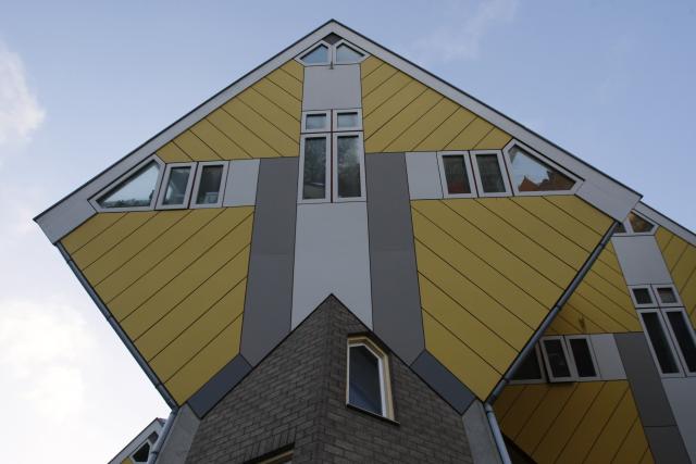 (251229) -- ROTTERDAM, Dec. 29, 2025 (Xinhua) -- This photo taken on Dec. 28, 2025 shows the cube houses in Rotterdam, the Netherlands. The cube houses, designed by Dutch architect Piet Blom, were built in the 1980s. A total of 38 cube houses resemble an interconnected "Rubik's Cube" and have become a distinctive architectural landmark in Rotterdam. (Xinhua/Shao Haijun)