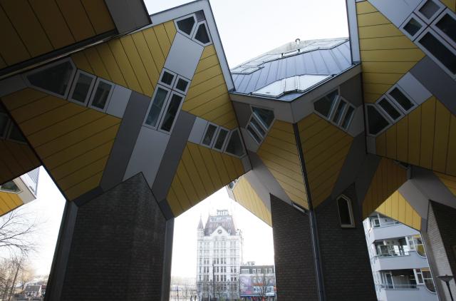 (251229) -- ROTTERDAM, Dec. 29, 2025 (Xinhua) -- This photo taken on Dec. 28, 2025 shows the cube houses in Rotterdam, the Netherlands. The cube houses, designed by Dutch architect Piet Blom, were built in the 1980s. A total of 38 cube houses resemble an interconnected "Rubik's Cube" and have become a distinctive architectural landmark in Rotterdam. (Xinhua/Shao Haijun)