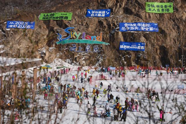 (251229) -- HUZHOU, Dec. 29, 2025 (Xinhua) -- Tourists have fun at the SkyLand ski resort in Anji County of Huzhou City, east China's Zhejiang Province on Dec. 28, 2025. Skiing and a variety of other winter sports have become a popular seasonal pastime for a growing number of people in Zhejiang Province. The province boasts many ice and snow resorts, both indoor and outdoor, providing ample choices for enthusiasts. Notable examples include the Wansongling Ski Resort in Hangzhou, Qiaobo Ice and Snow World in Shaoxing, Taihu Lake Longemont Paradise in Huzhou, SkyLand ski resort in Anji, and Pan'an ski Resort in Jinhua. Moreover, such facilities are increasingly taking root across the province.
   According to a ski industry white paper, the 2024-2025 winter sports season saw a national participation of 26.05 million skiers. Zhejiang ranked sixth nationwide with 1.29 million participants, leading all southern Chinese provinces in skier numbers. (Xinhua/Huang Zongzhi)