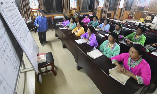 (251230) -- NANNING, Dec. 30, 2025 (Xinhua) -- Villagers attend a night class at Wuying Miao village in Rongshui Miao Autonomous County, south China's Guangxi Zhuang Autonomous Region, Sept. 26, 2025.
  Recent years saw local authorities in Guangxi boosting the development of tourism in the rural areas through a variety of cultural initiatives. (Xinhua/Huang Xiaobang)