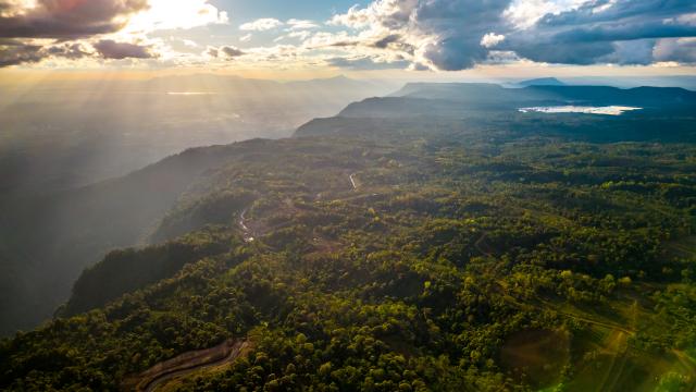 (251230) -- CHAMPASAK, Dec. 30, 2025 (Xinhua) -- This aerial photo taken on Dec. 17, 2025 shows a view of the Bolaven Plateau in Champasak Province, Laos. TO GO WITH "Feature: Lao coffee's aroma goes global" (Photo by Ma Huaizhao/Xinhua)