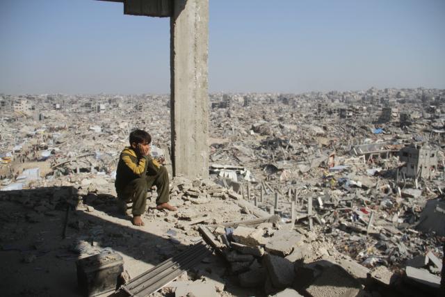 (251230) -- BEIJING, Dec. 30, 2025 (Xinhua) -- A Palestinian child is seen on a destroyed building in Jabalia refugee camp in the northern Gaza Strip, on Jan. 29, 2025. 6. Mideast conflicts inflict catastrophic losses, peace remains elusive
   On Oct. 9, Israel and the Palestinian Islamic Resistance Movement (Hamas) reached a first-phase ceasefire agreement in Gaza, though sporadic violence has continued. More than two years of prolonged fighting have triggered an unprecedented humanitarian catastrophe in Gaza, with over 70,000 people killed, more than 170,000 injured and nearly 2 million displaced.
   Over the past year, conflicts have flared repeatedly across the region, including the Israel-Palestine conflict, Israel-Lebanon conflict, Israel-Iran conflict and confrontations involving Yemen's Houthi forces and Israel. The United States' strikes on Iranian nuclear facilities under International Atomic Energy Agency safeguards have set a dangerous precedent. The political and diplomatic process to resolve the Iranian nuclear issue has reached a stalemate. Achieving lasting peace and stability in the Middle East still requires sustained and concerted efforts by the international community. (Photo by Abdul Rahman Salama/Xinhua)
