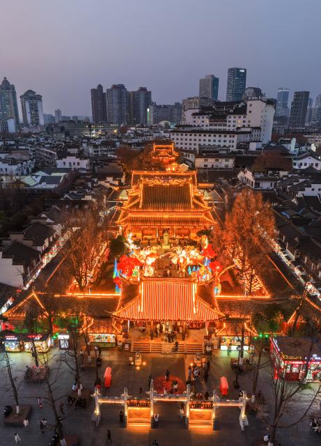 (251230) -- NANJING, Dec. 30, 2025 (Xinhua) -- This aerial drone photo taken on Dec. 30, 2025 shows lantern decorations at the Confucius Temple scenic area in Nanjing, east China's Jiangsu Province. The lantern decorations are displayed here in celebration of the upcoming New Year. (Xinhua/Li Bo)