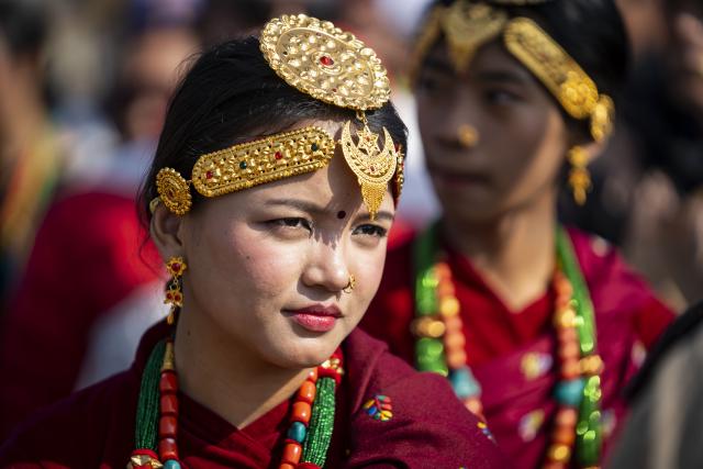 (251230) -- KATHMANDU, Dec. 30, 2025 (Xinhua) -- A woman in traditional attire from the Gurung community is pictured during the celebration of Tamu Lhosar festival to mark the commencement of Gurung New Year in Kathmandu, Nepal, Dec. 30, 2025. (Photo by Hari Maharjan/Xinhua)