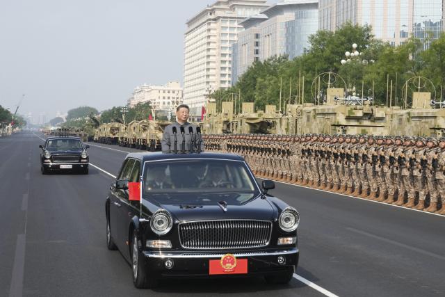 (251231) -- BEIJING, Dec. 31, 2025 (Xinhua) -- Chinese President Xi Jinping, also general secretary of the Communist Party of China Central Committee and chairman of the Central Military Commission, reviews troops during a grand gathering commemorating the 80th anniversary of the victory in the Chinese People's War of Resistance against Japanese Aggression and the World Anti-Fascist War in Beijing, capital of China, Sept. 3, 2025. (Xinhua/Li Gang)