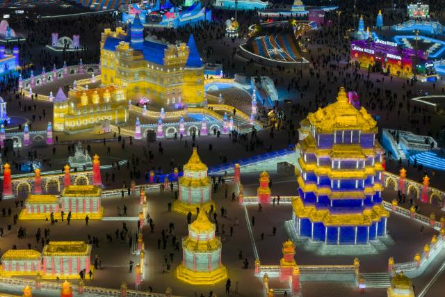 (260101) -- HARBIN, Jan. 1, 2026 (Xinhua) -- An aerial drone photo shows tourists visiting the Harbin Ice-Snow World in Harbin, northeast China's Heilongjiang Province, Dec. 31, 2025.
  Many scenic spots in the "Ice City" Harbin was illuminated Wednesday night, drawing tourists to celebrate the New Year. (Xinhua/Zhang Tao)