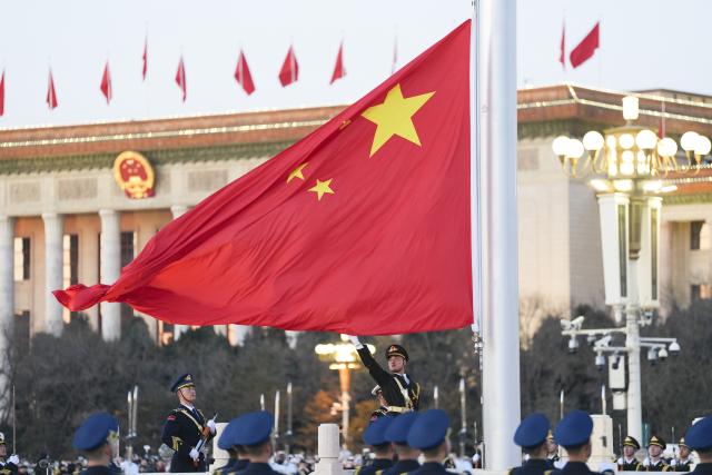 (260101) -- BEIJING, Jan. 1, 2026 (Xinhua) -- A grand national flag-raising ceremony is held at Tian'anmen Square in Beijing, capital of China, Jan. 1, 2026. (Xinhua/Xie Han)