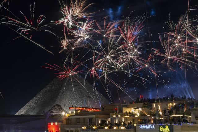 (260101) -- GIZA, Jan. 1, 2026 (Xinhua) -- Fireworks explode near the Giza Pyramids in celebration of the New Year in Giza, Egypt, Jan. 1, 2026. (Xinhua/Xin Mengchen)