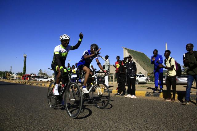 (260101) -- KHARTOUM, Jan. 1, 2026 (Xinhua) -- Cyclists take part in a cycling race during Khartoum Youth Sports Festival in Khartoum, Sudan, Jan. 1, 2026. Khartoum on Thursday launched the Khartoum Youth Sports Festival under the slogan "Together We Make Life," marking Sudan's 70th independence anniversary and offering a rare glimpse of public life nearly three years into the country's civil war. (Photo by Mohamed Khidir/Xinhua)