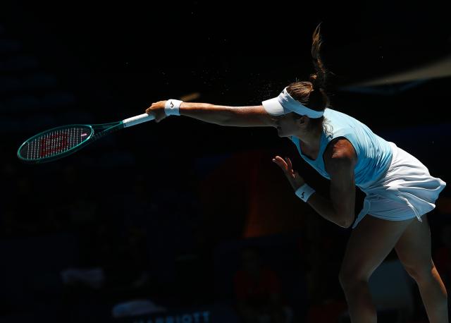 (260102) -- PERTH, Jan. 2, 2026 (Xinhua) -- Solana Sierra of Argentina hits a return during the women's singles match against Jessica Bouzas Maneiro of Spain in the Group A round robin match between Spain and Argentina at the 2026 United Cup tennis tournament in Perth, Australia, Jan. 2, 2026. (Photo by Zhou Dan/Xinhua)