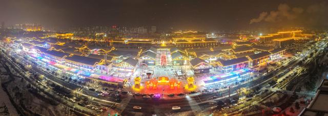 (260102) -- BEIJING, Jan. 2, 2026 (Xinhua) -- A panoramic drone photo taken on Jan. 1, 2026 shows a light festival in Wuwei, northwest China's Gansu Province. China's economy kicked off 2026 with robust momentum, as evidenced by bustling economic activity in the year's first days. (Photo by Jiang Aiping/Xinhua)
